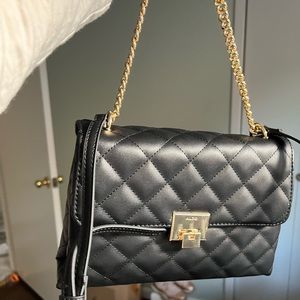 - Aldo Purse